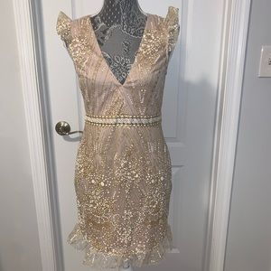 Champagne mini and open back dress